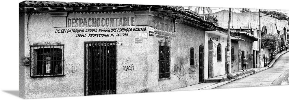 Black and white panoramic photograph of an urban street in Mexico. From the Viva Mexico Panoramic Collection.