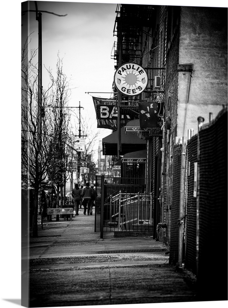 A black and white photograph a sidewalk in Brooklyn.