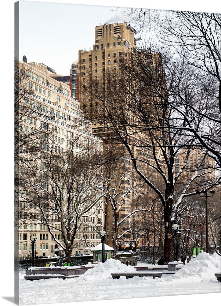 A photograph looking at surrounding buildings around Central Park in winter, in NYC.