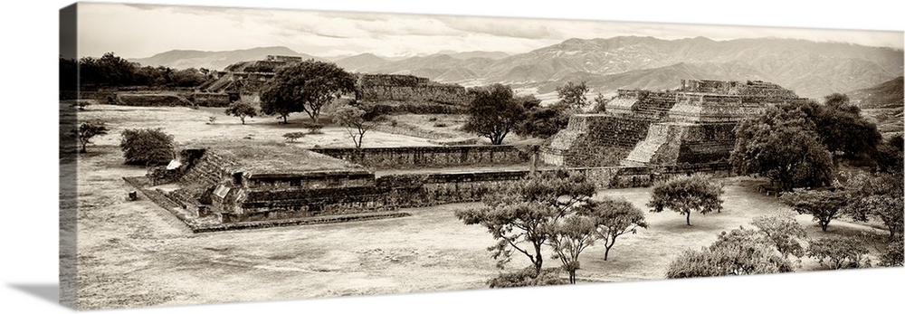 Sepia panoramic photograph of the pyramid of Monte Alban in Oaxaca, Mexico. From the Viva Mexico Panoramic Collection.