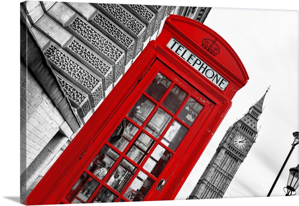 Angled photo of a red telephone booth with the Big Ben clock tower in the background.