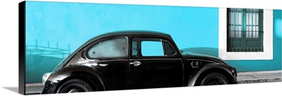 The Black VW Beetle Car with Turquoise Wall