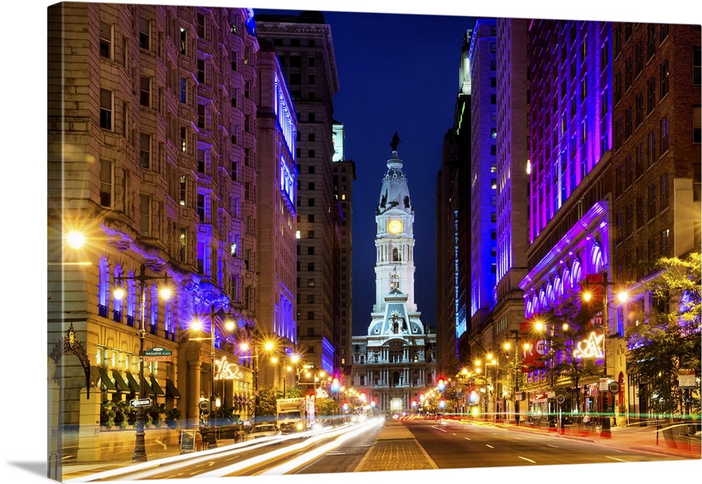 Fine art photograph of City Hall in Philadelphia in the evening, with light trails in the street.