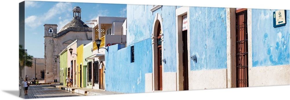 Panoramic photograph of a street scene in Campeche, Mexico, with a bright blue building. From the Viva Mexico Panoramic Co...