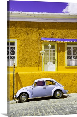 VW Beetle Car and Yellow Wall