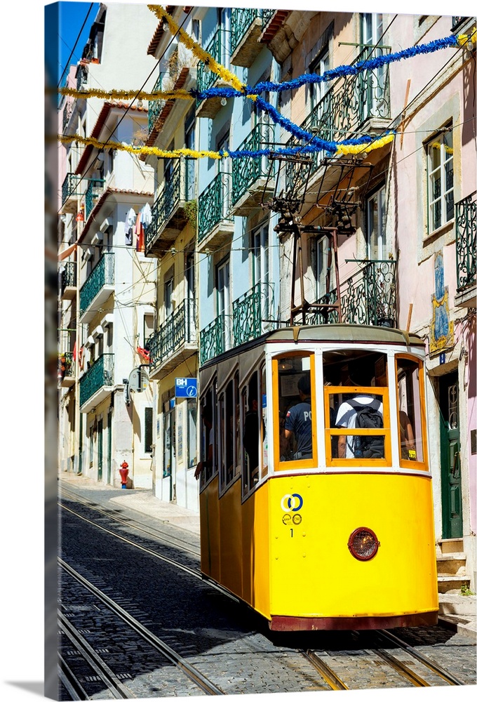 It's a photo of the street Da Bica with the funicular of Bica in the district of Bairro Alto, the most symbolic yellow tra...