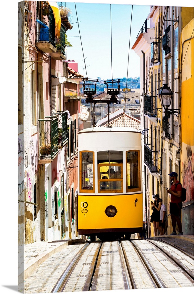It's a view of the street Da Bica with the funicular of Bica in the district of Bairro Alto, the most symbolic yellow tram...