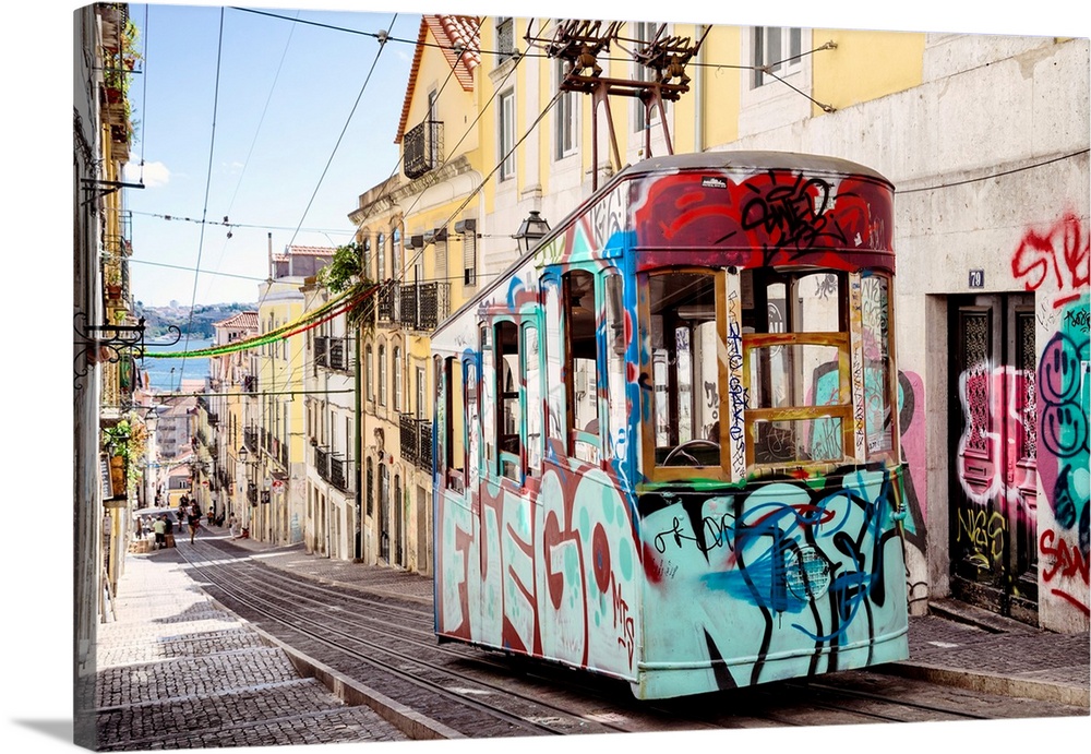 It's the funicular of Bica with graffiti in the street Da Bica in Lisbon with colourful facades in Portugal.