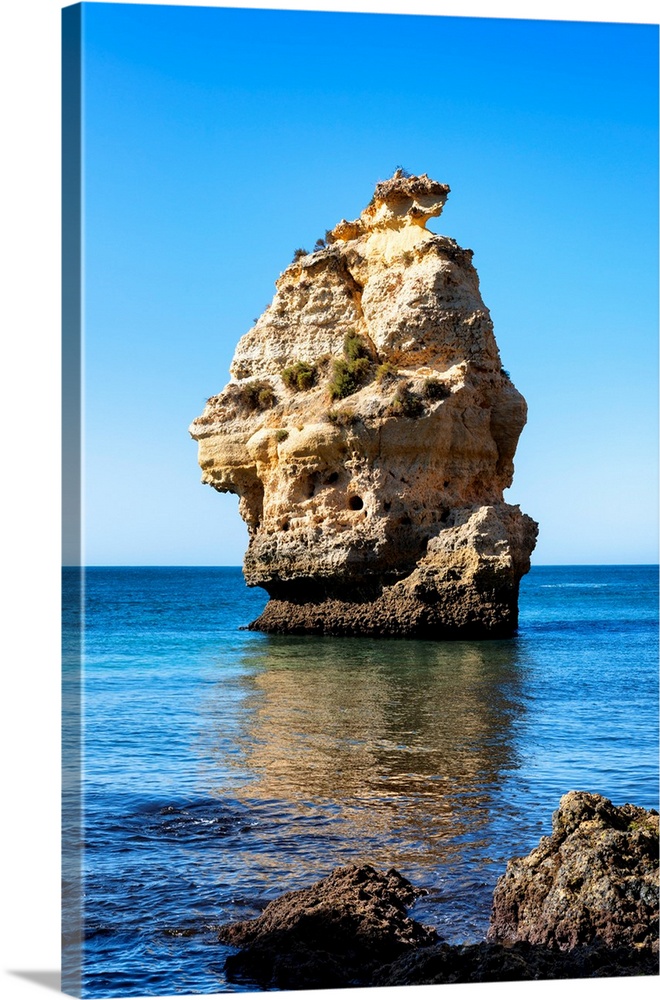 These are the cliffs along Praia da Marinha at Atlantic Ocean, Algarve, Portugal.