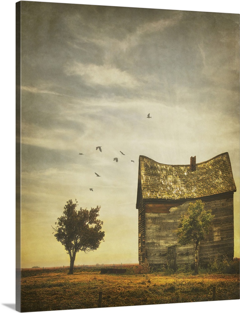 Surreal image of an old distorted prairie building.