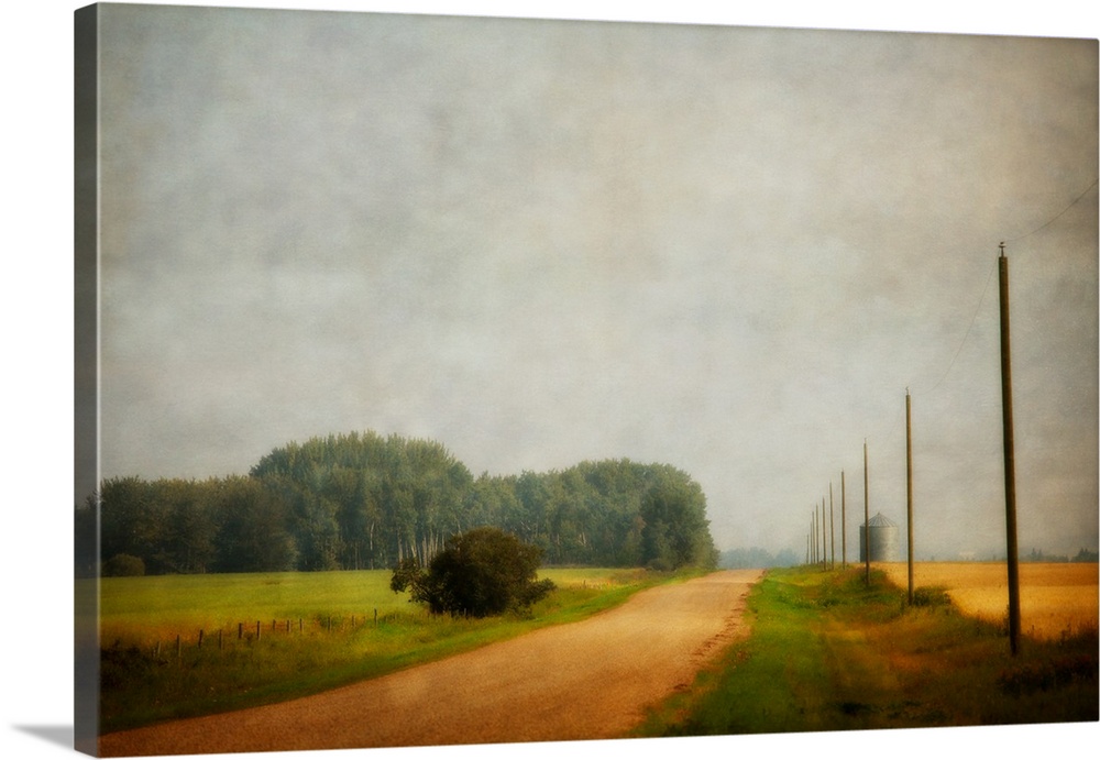 A distressed photo of country landscape with a silo in the background.