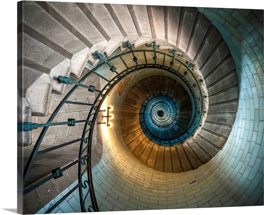 Old spiral staircase in the center of a lighthouse.