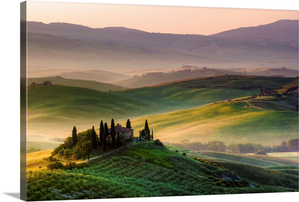 A great sunrise in Tuscany, on the hills of Val d'Orcia.