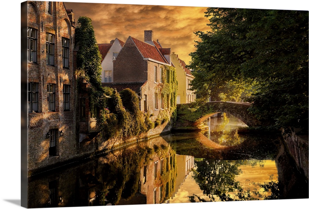 Canal in Bruges, Belgium, at sunset.
