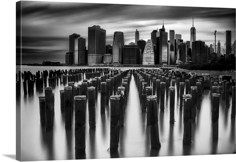 New York City skyline seen from the harbor, in black and white.