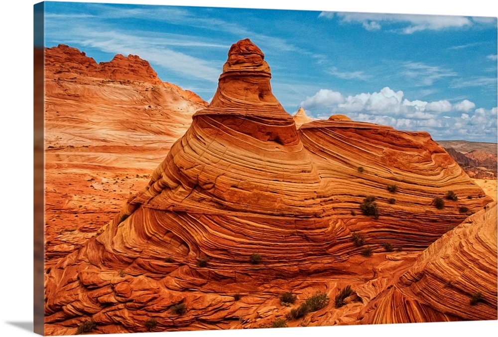 A tall rock formation in the desert in Vermilion Cliffs, Arizona.