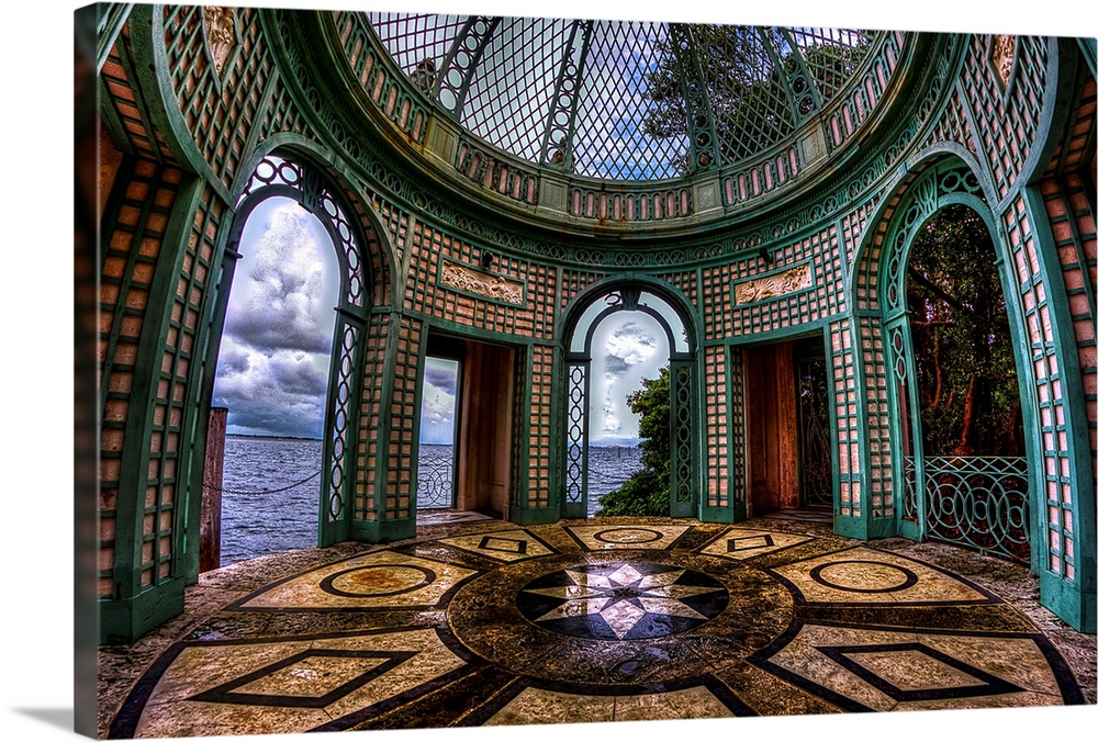 Elaborately decorated round room with patterned tiles and windows.