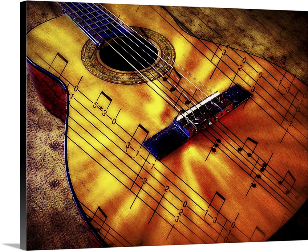 Musical notation on the surface of an acoustic guitar.