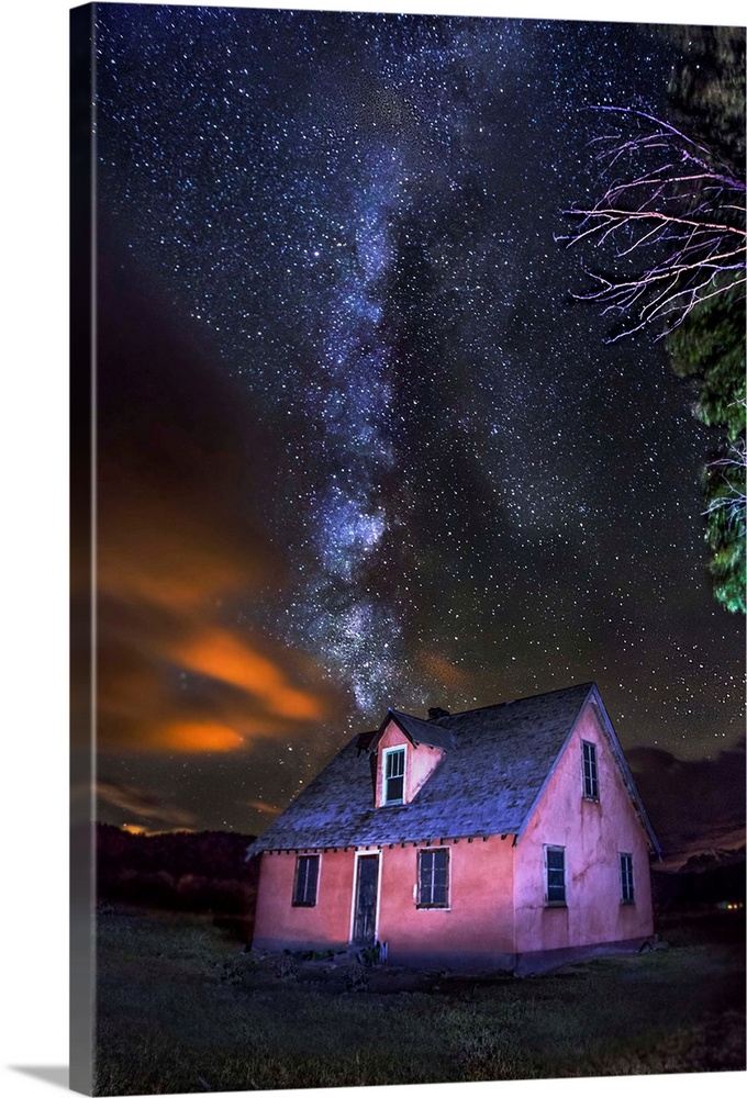 The Milky Way over the historic Mormon Row home in north Jackson, Wyoming.
