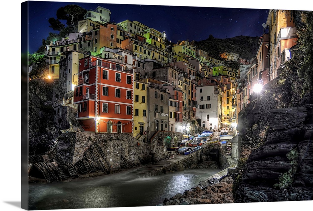 Riomaggiore at the edge of the ocean, in the evening, Italy.