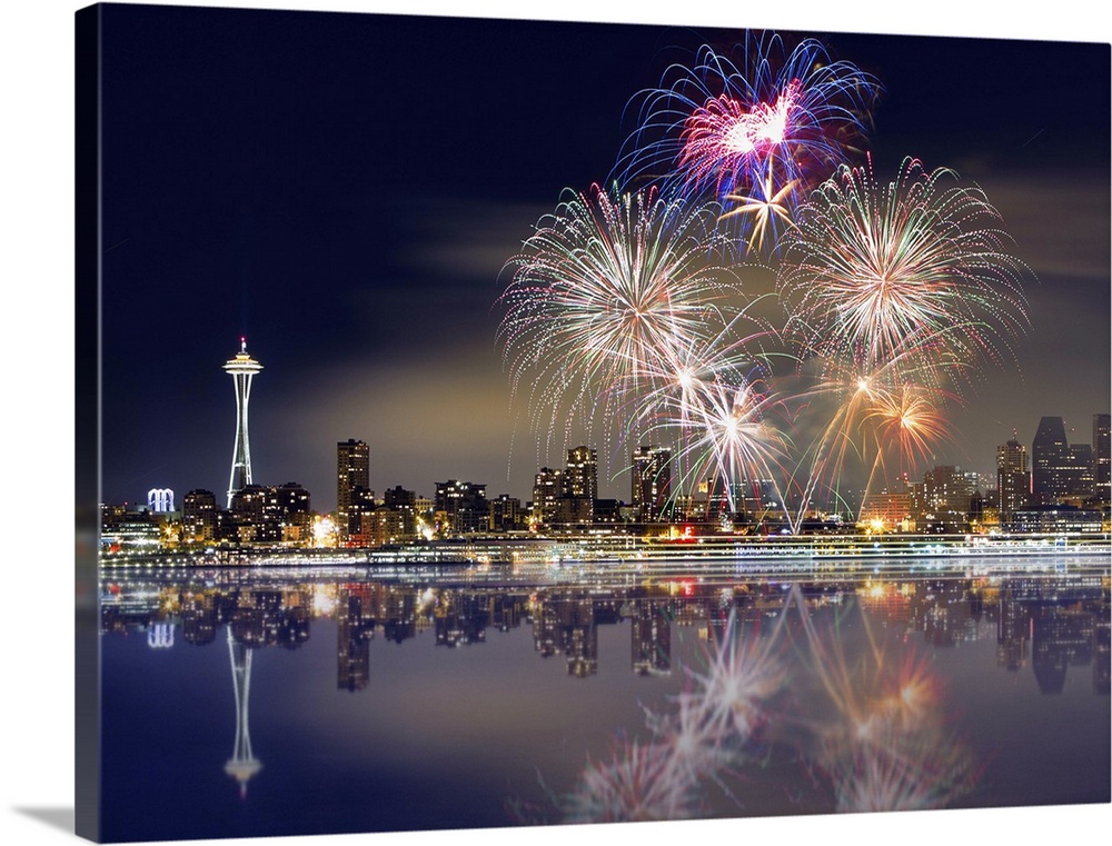 Fireworks and Seattle skyline with reflections.