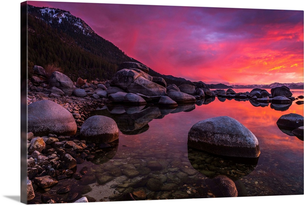 Boulders on the shores of Lake Tahoe at sunset.