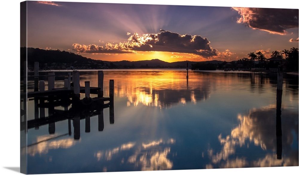 A beautiful sunset with a crown cloud at Brisbane waters, Blackwall, Central Coast, NSW, Australia.