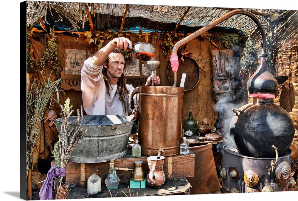 A man distilling chemicals using an alembic vessel.