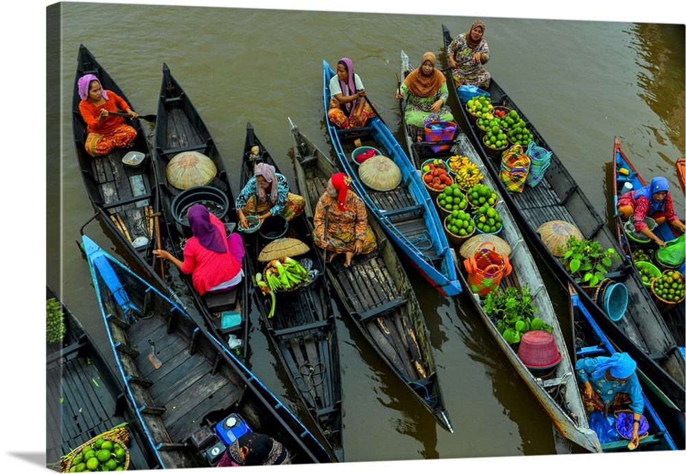 Colorful boats full of goods to sell at the market in Bangkok, Thailand.