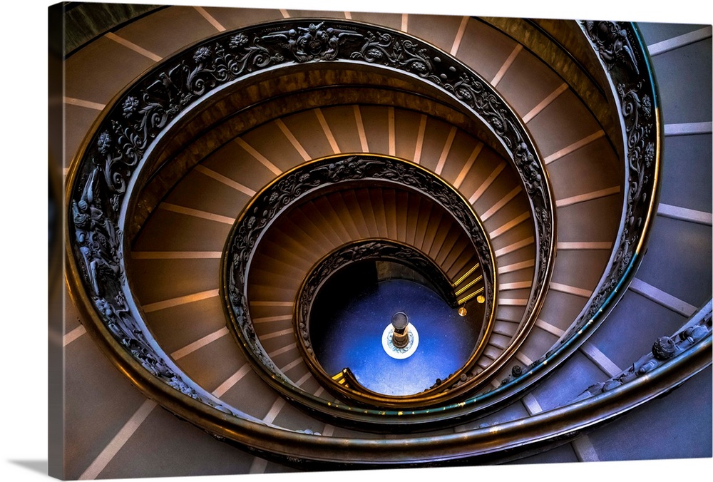 Looking down a spiral staircase in the Vatican Museum.