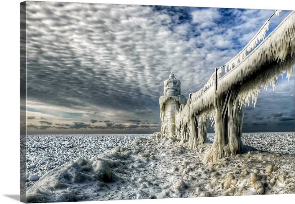 A pier completely frosted over with ice in the winter, Saint Joseph, Michigan.