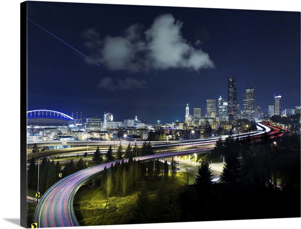 Light trails flowing into the city of Seattle, Washington, in the evening.