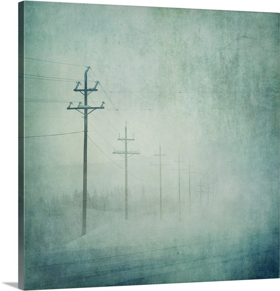 Power poles disapperaing in the ice fog