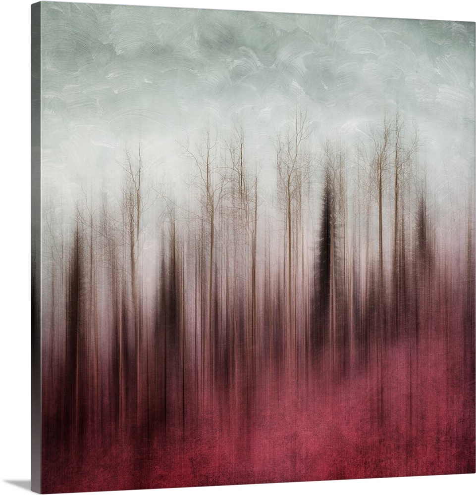 An artistic photograph of a blurred forest in red tones under a gray sky.