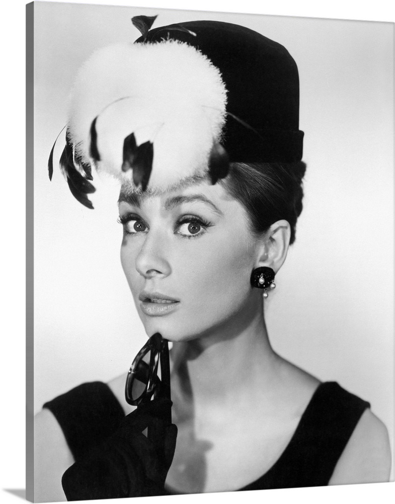 This decorative wall art is a portrait photograph of the Hollywood actress in character as the sensational Holly Golightly...