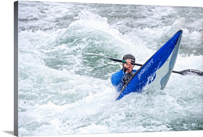 Blue Kayaker paddling through Whitewater Rapids - I