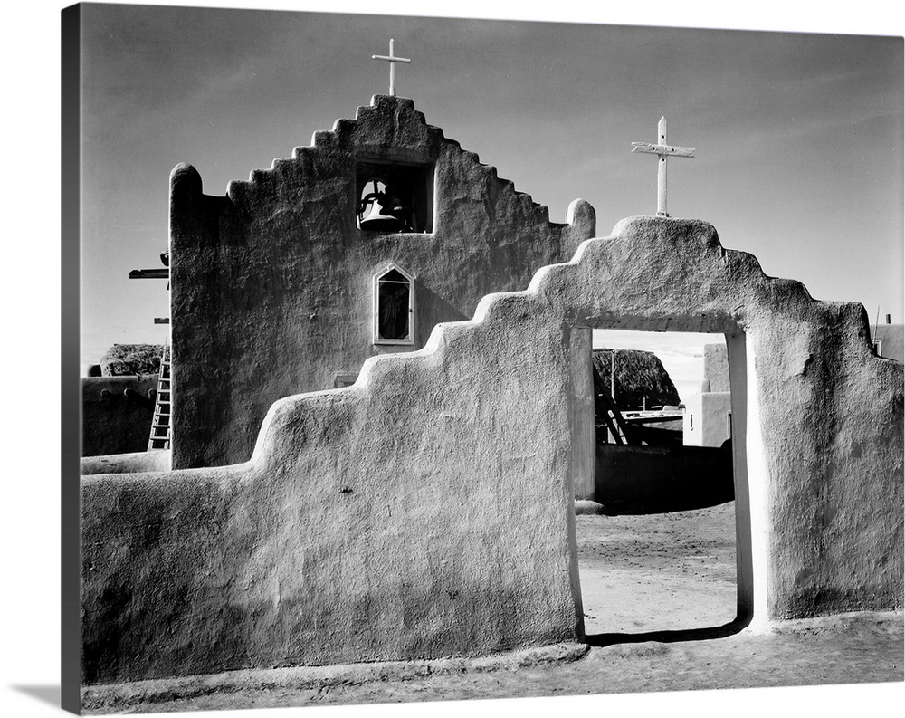Church, Taos Pueblo, New Mexico, 1941, full side view of entrance with gate to the right.