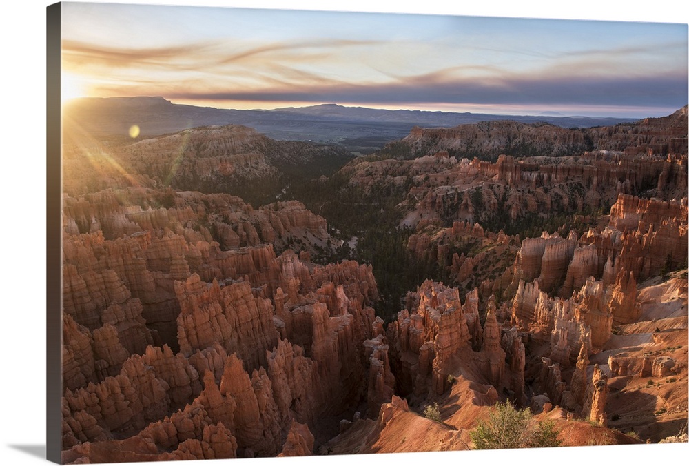 Pastel clouds at sunset over the striped hoodoos of Bryce Canyon Amphitheater, Bryce Canyon National Park, Utah.