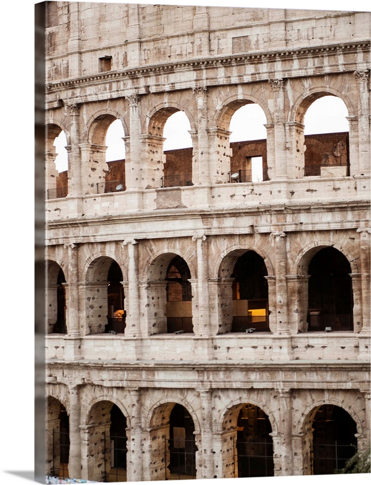 Detailed photograph of the Colosseum walls in Rome.