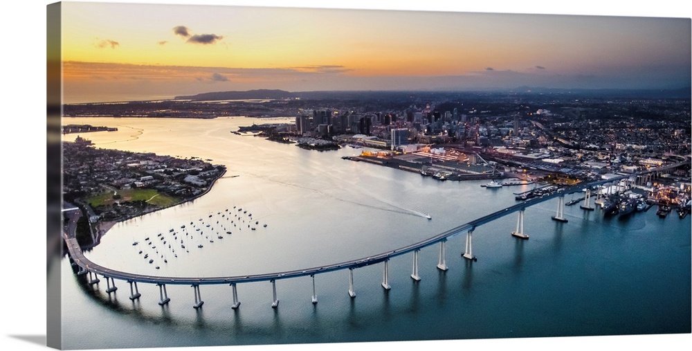 Aerial view of the Coronado Bridge in San Diego, California, at sunset.