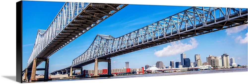 Panoramic photograph of the Crescent City Connection, formerly the Greater New Orleans Bridge, twin cantilever bridges tha...