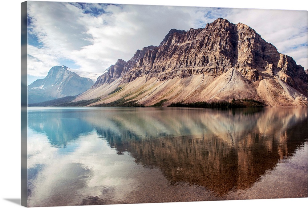 Crowfoot Mountain reflected in Bow Lake located in Banff National Park, Alberta, Canada.