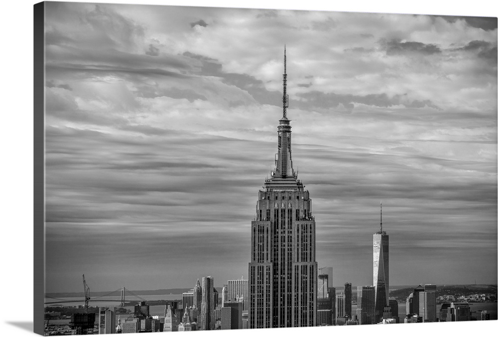 Top view of the Empire State Building Broadcast Tower against dramatic clouds.