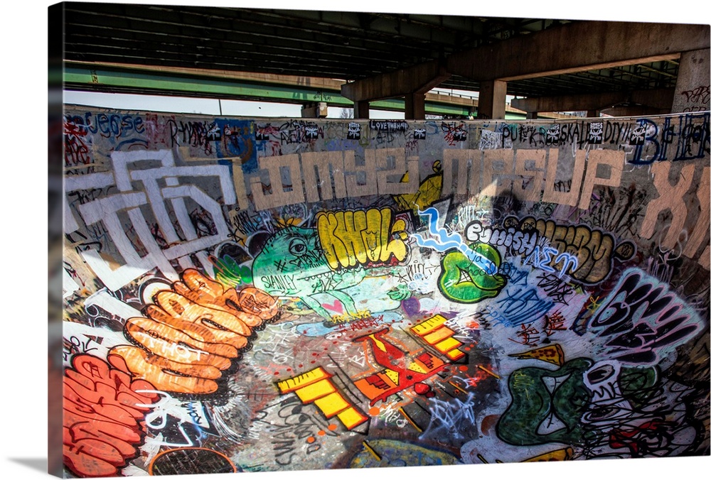 A concrete bowl is covered in graffiti at FDR Skatepark, Philadelphia.