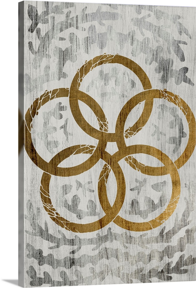 Gold leaf on weathered wood with a fern pattern of five gold rings.