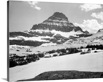 From Logan Pass, Glacier National Park, Looking Across Barren Land To Mountains