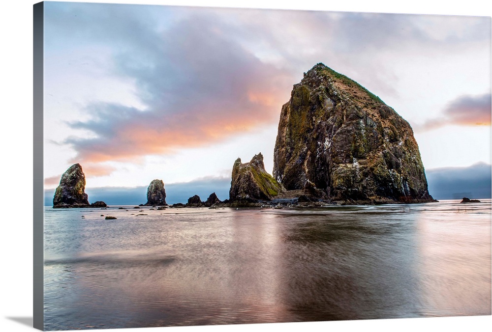View of a giant sea stack called, "Haystack Rock" at Cannon Beach in Portland, Oregon.