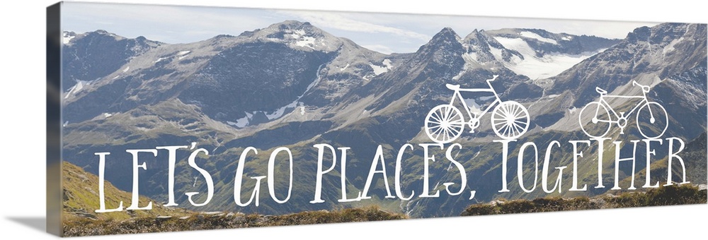 Handwritten sentiment with two small bicycles over an image of a snowy mountain range.