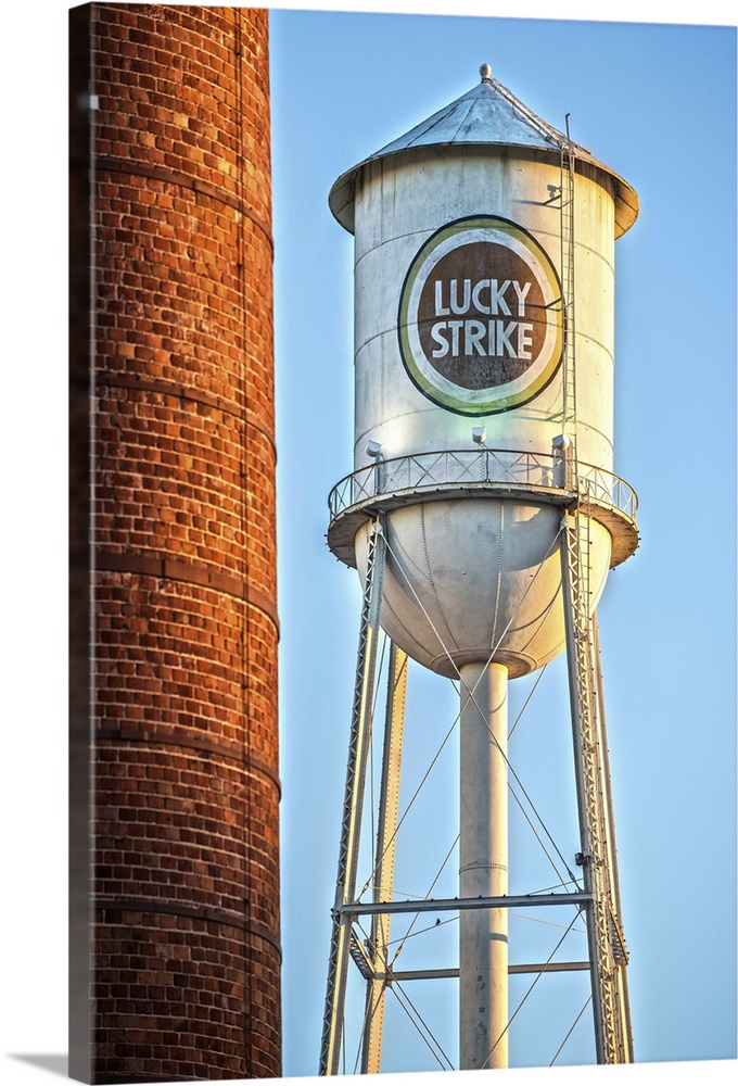 Lucky Strike Water Tower and Smokestack at sunset, American Tobacco Historic District, Durham, North Carolina.