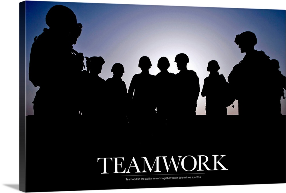Giant photograph includes a silhouetted group of soldiers that has an inspirational message for teamwork at the bottom.